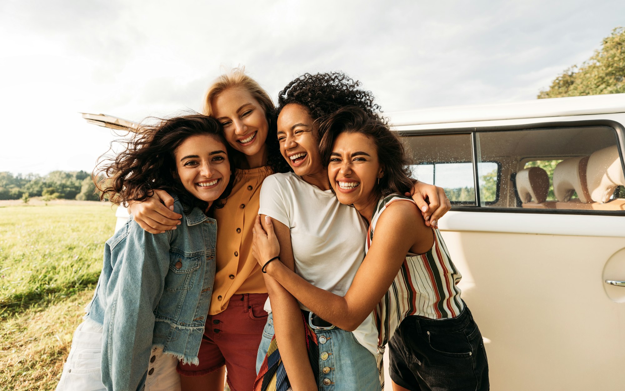 Women enjoying summer road trip